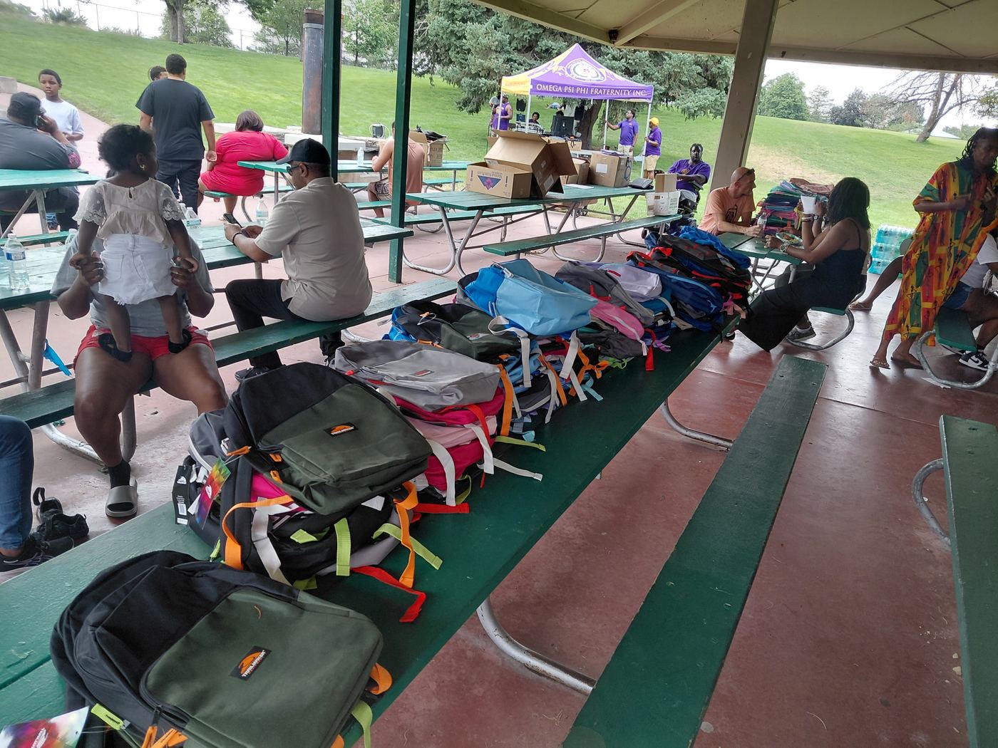 Backpacks lined up for giveaway